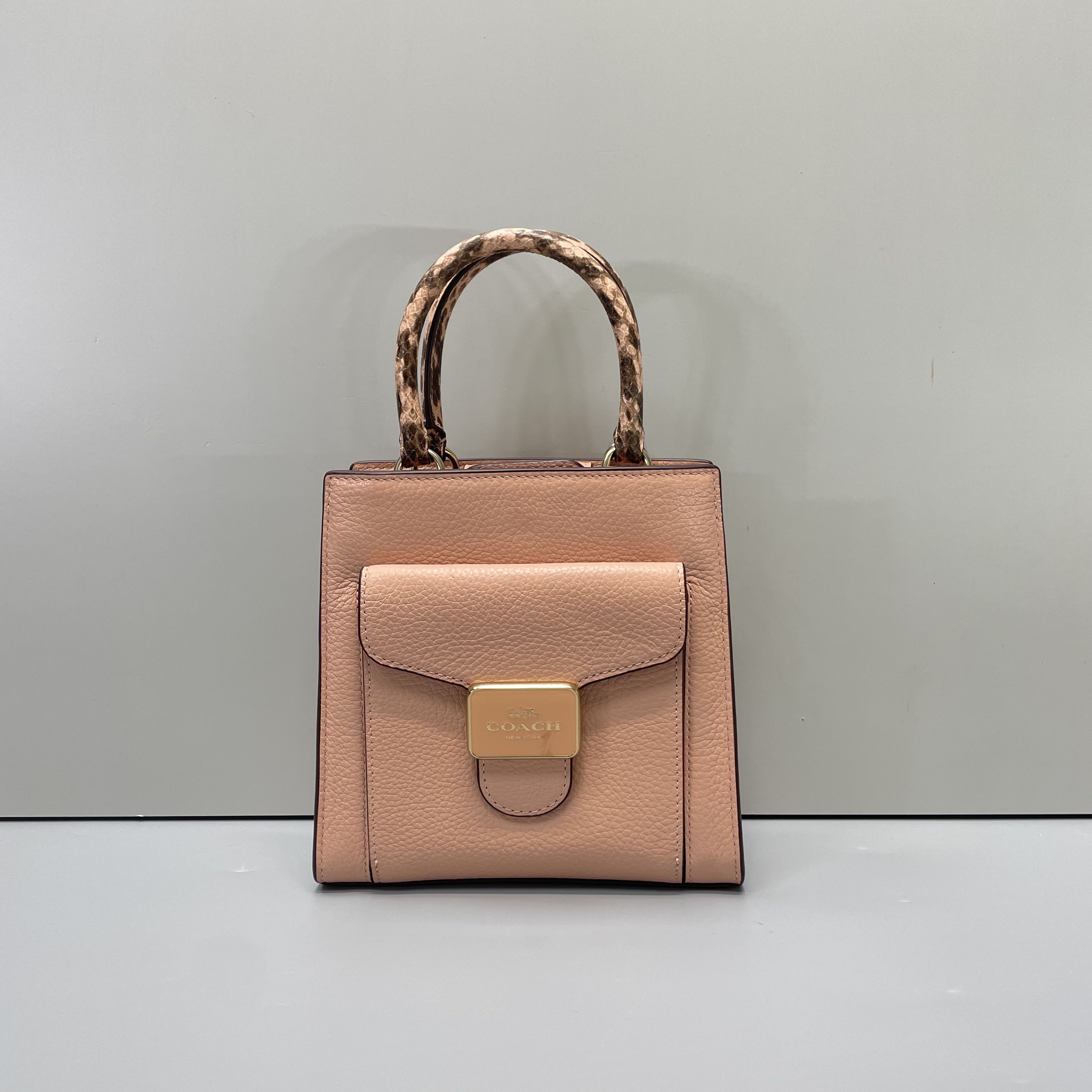 99新 COACH/蔻驰 粉色拼蛇纹琴谱包17*17*7cmL092910