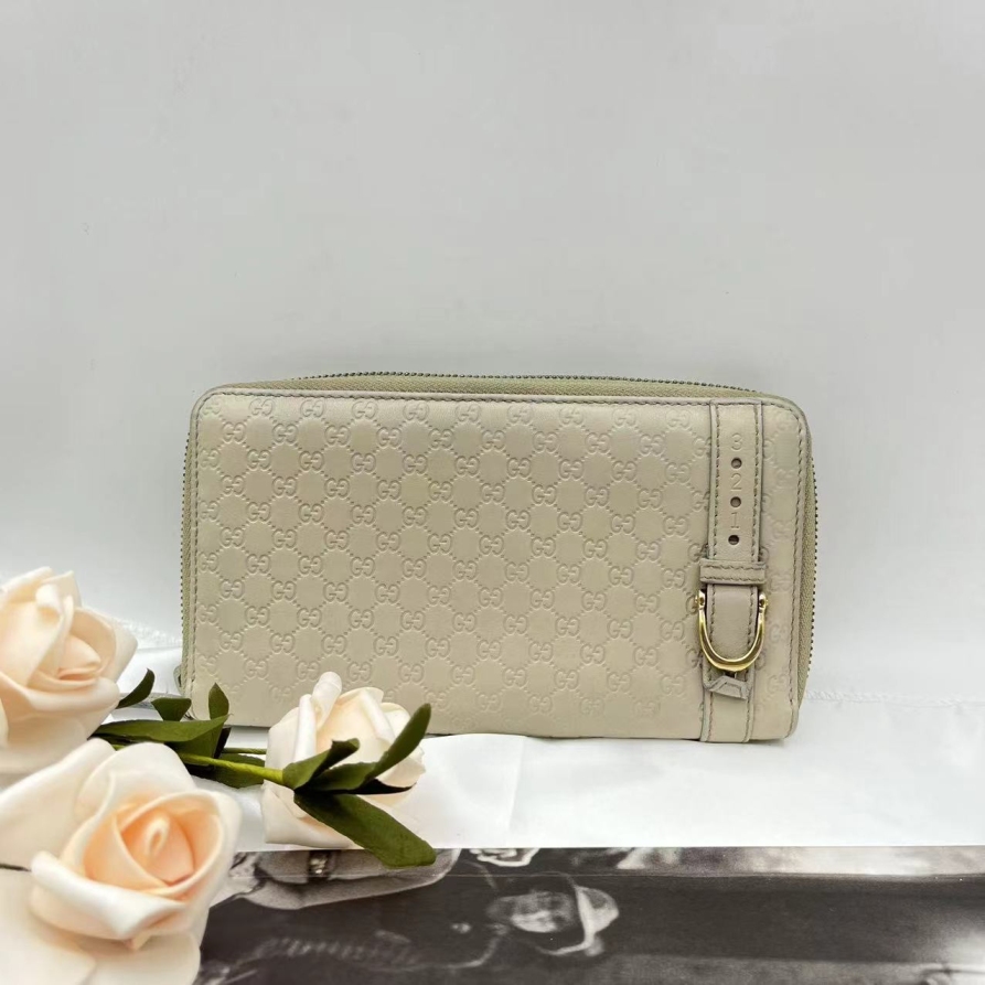 95新 GUCCI/古驰 白色压花钱包658 1299