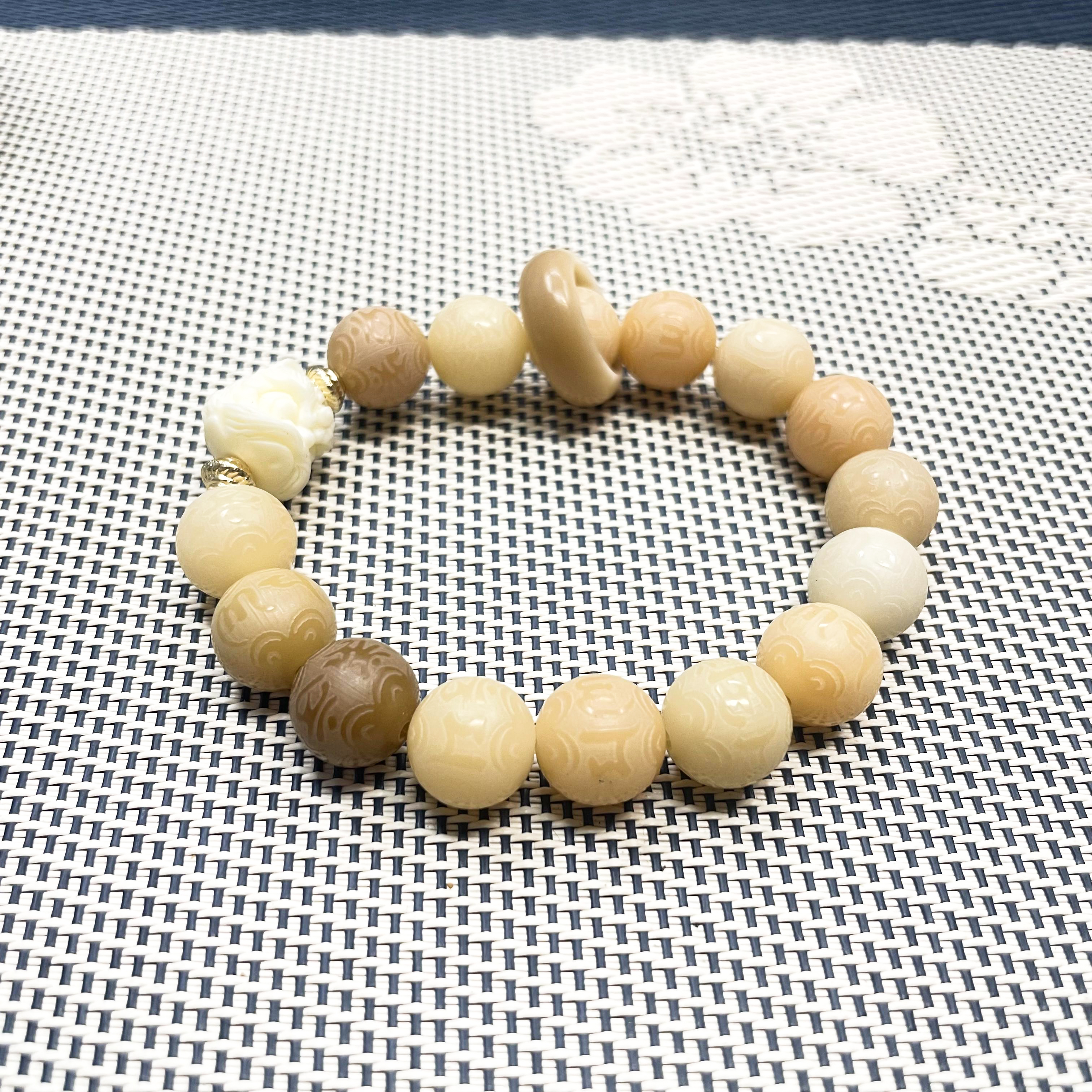 单圈素圈圆珠菩提手串颗颗雕刻六字搭配醒狮跑环