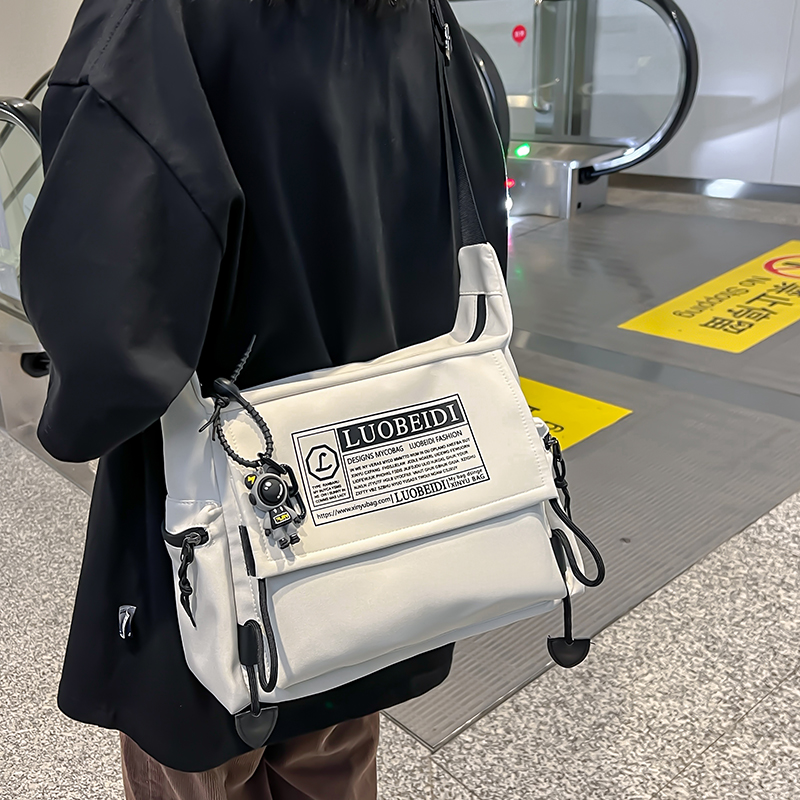 sunman斜挎包男潮牌工装单肩包男款背包大学生邮差包女上课通勤包