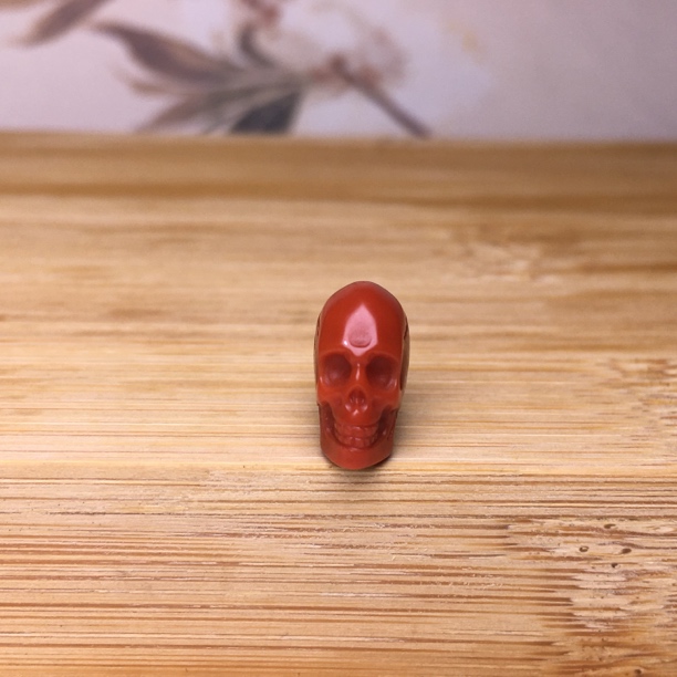 天然川料南红鸽血红满肉色精品手工骷髅头背云未打孔