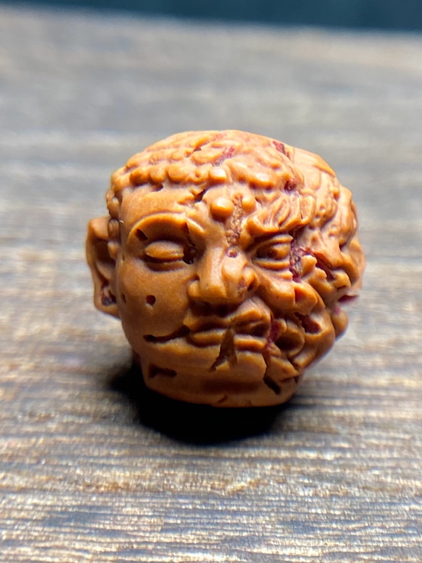 桃核雕刻一念之间单颗挂坠背云