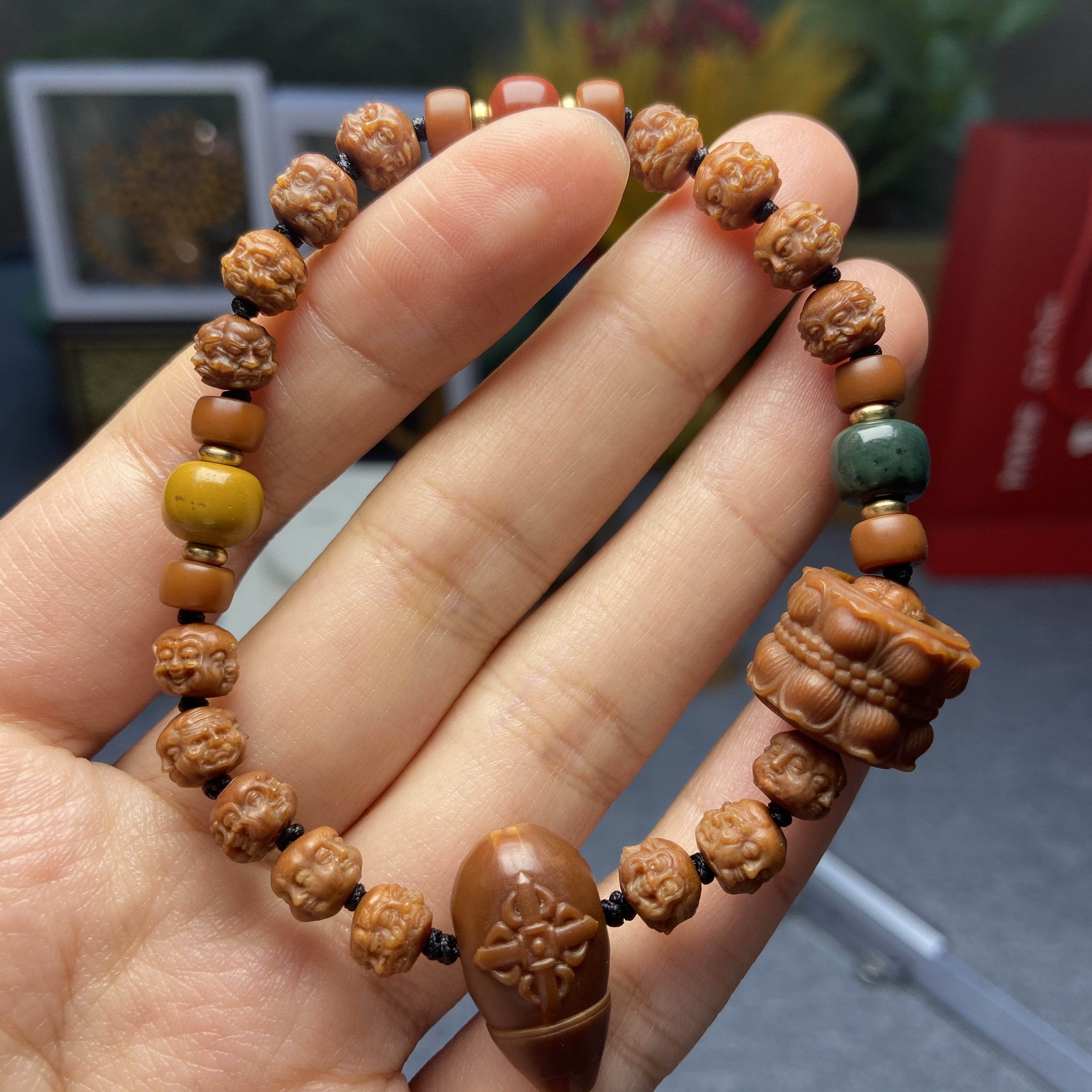 橄榄核 玉化0.8 核尖千面佛 文玩手串HTZL-0413