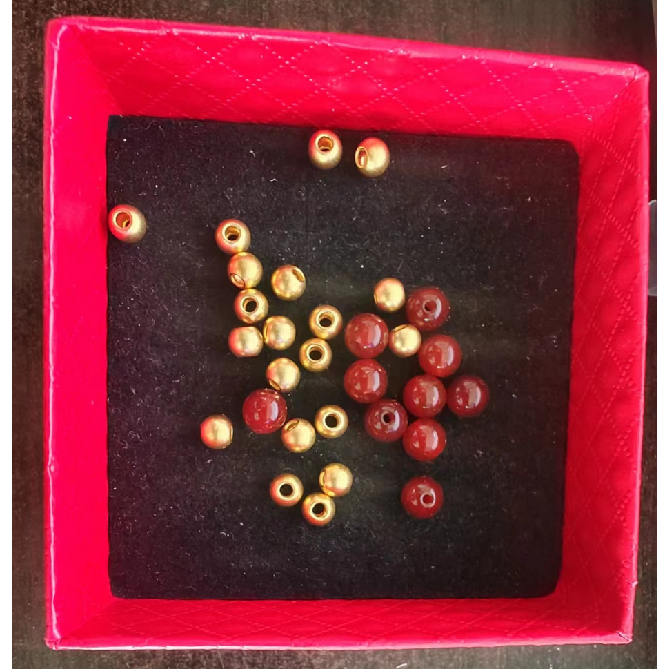 足金999黄金3mm光面40颗约1.2g(金珠玛瑙串好发出)