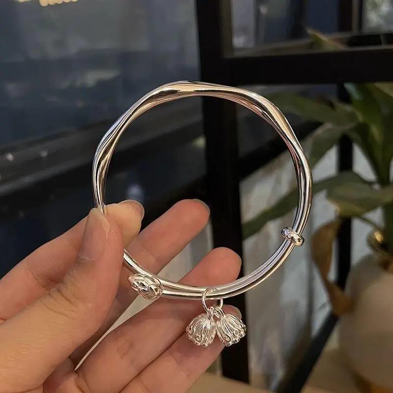足银手镯  老凰祥9999莫比乌斯莲蓬纯银手镯女实心推拉足银镯子送