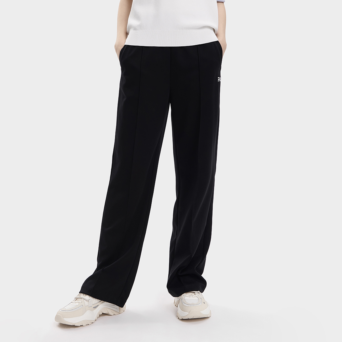 Fila/斐乐女子宽松百搭时尚休闲针织秋季长裤休闲裤F11W338603