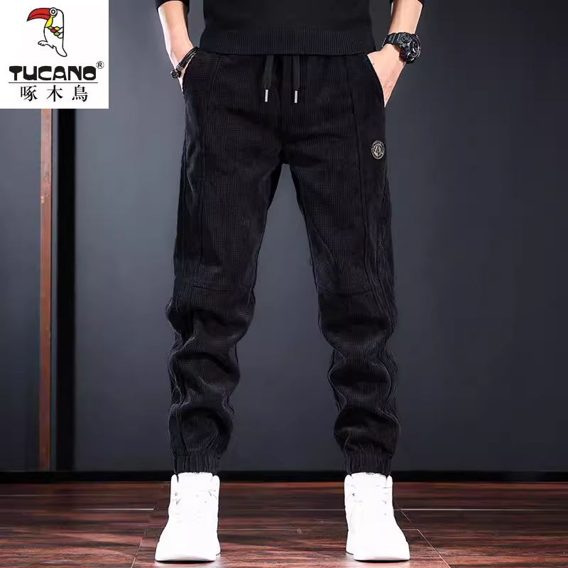 啄木鸟2025秋冬季灯芯绒休闲裤男加绒加厚宽松大码束脚运动裤子男
