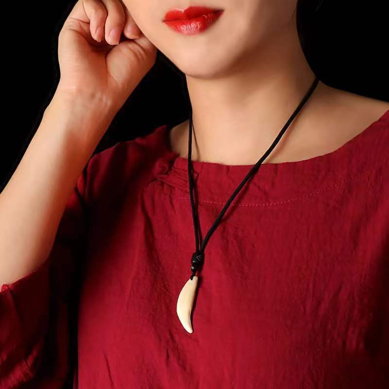 非金属布艺吊坠 4.0到4.2厘米真黑狗牙创意饰品男大藏獒牙女挂件