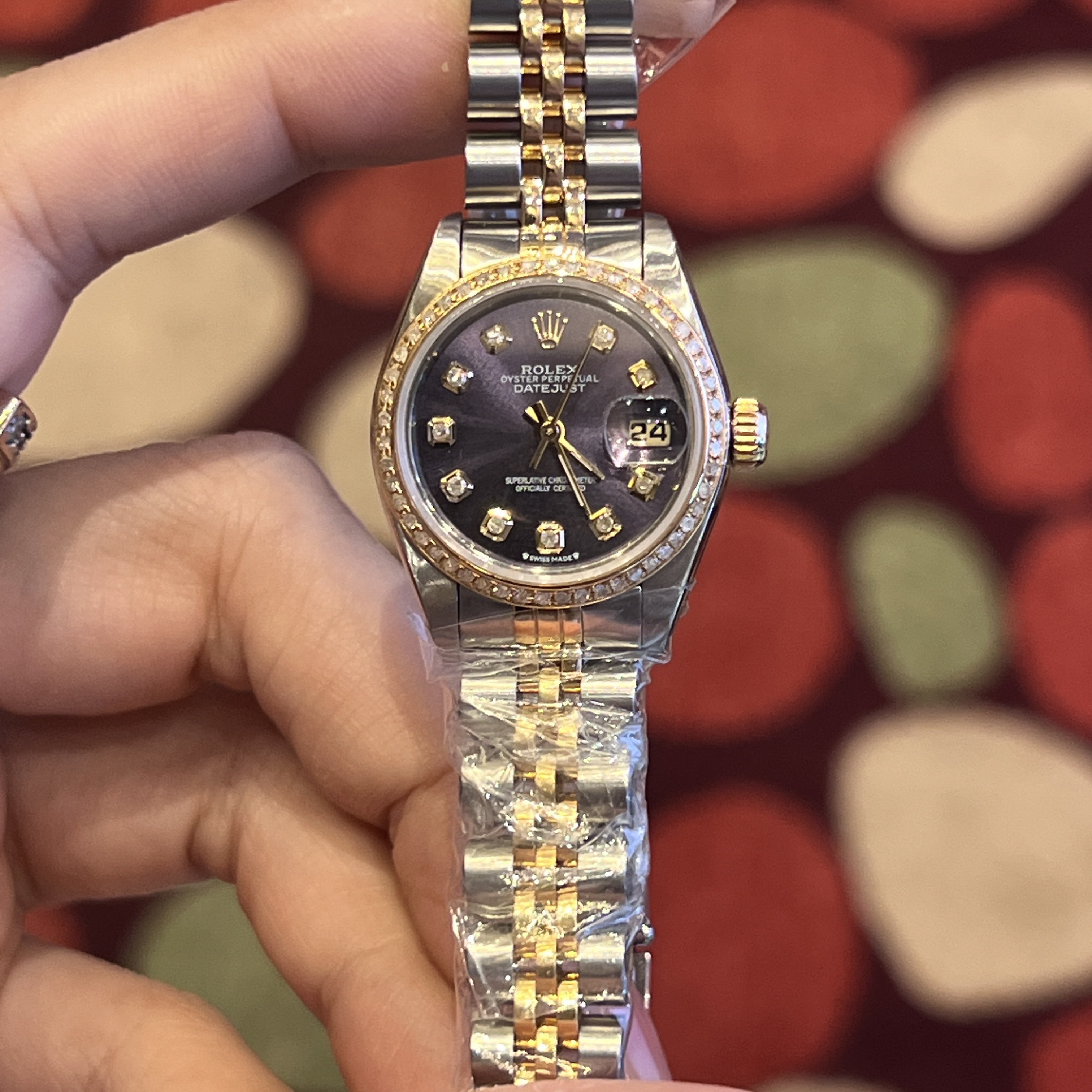 99新 Rolex/劳力士 表展69173机械26MM紫盘间金女表/WHP024530