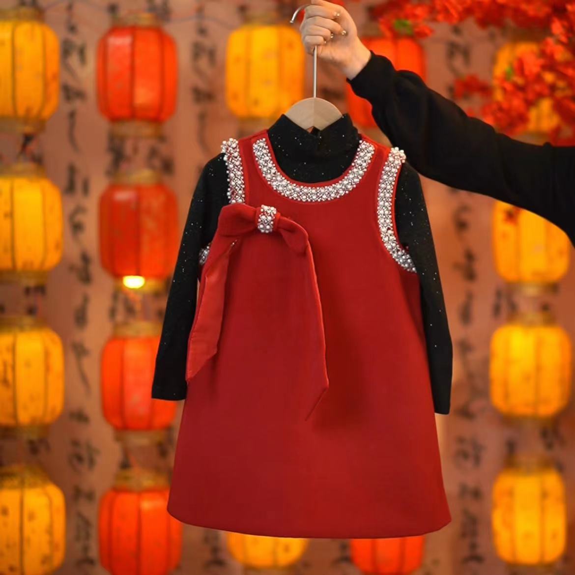 女童毛呢圣诞节A字背心裙2023冬装新款韩版蝴蝶结公主呢子连衣裙