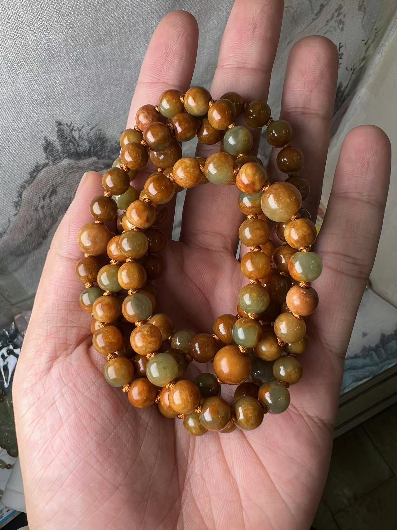 析木河磨玉精品红皮卡八108粒纯手工打造