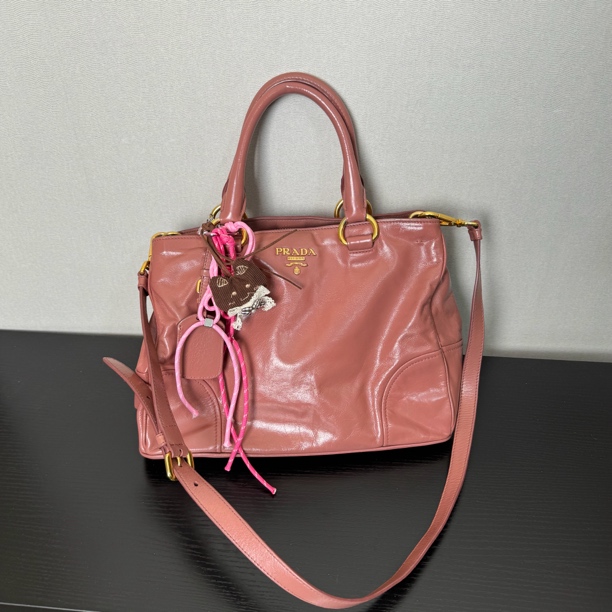 95新 Prada/普拉达 粉色油蜡皮单肩斜挎包