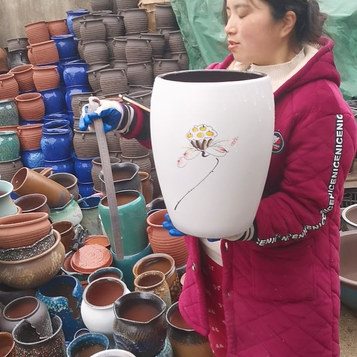 红陶口23高33瑕疵一个