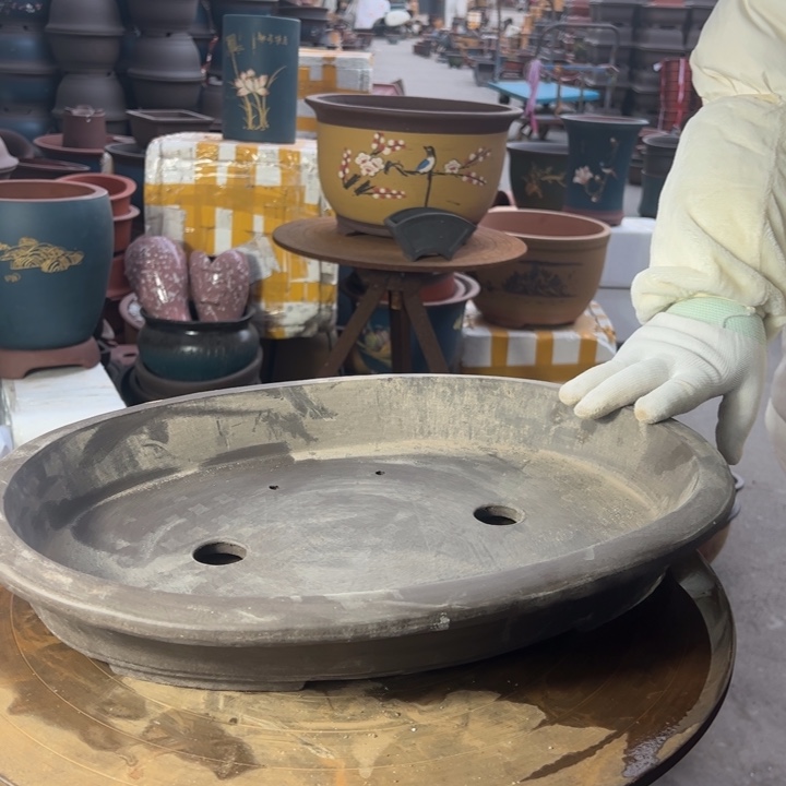 紫砂44黑椭圆有孔花盆花盆