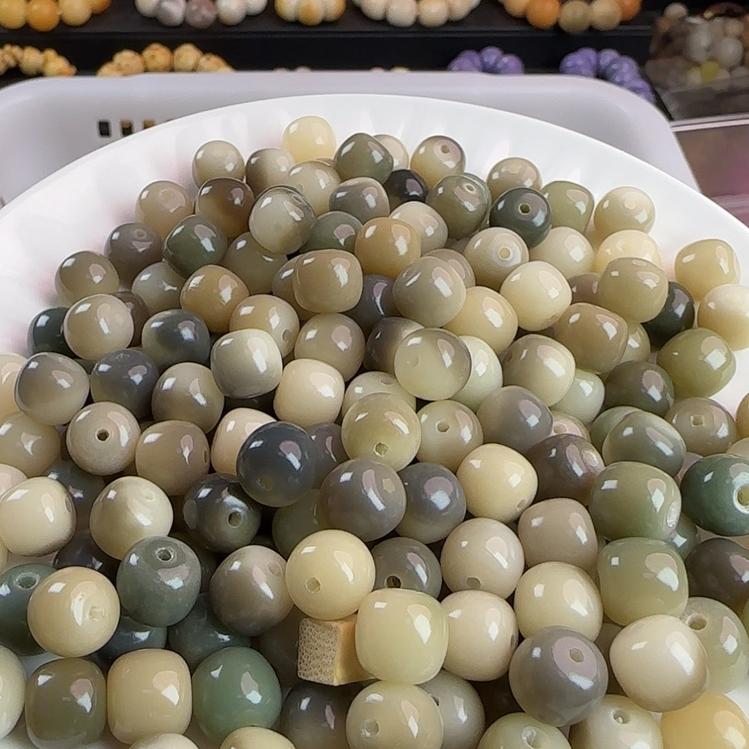 手串菩提根/象牙果卡10醉红颜桶1000颗批发（玻璃底）