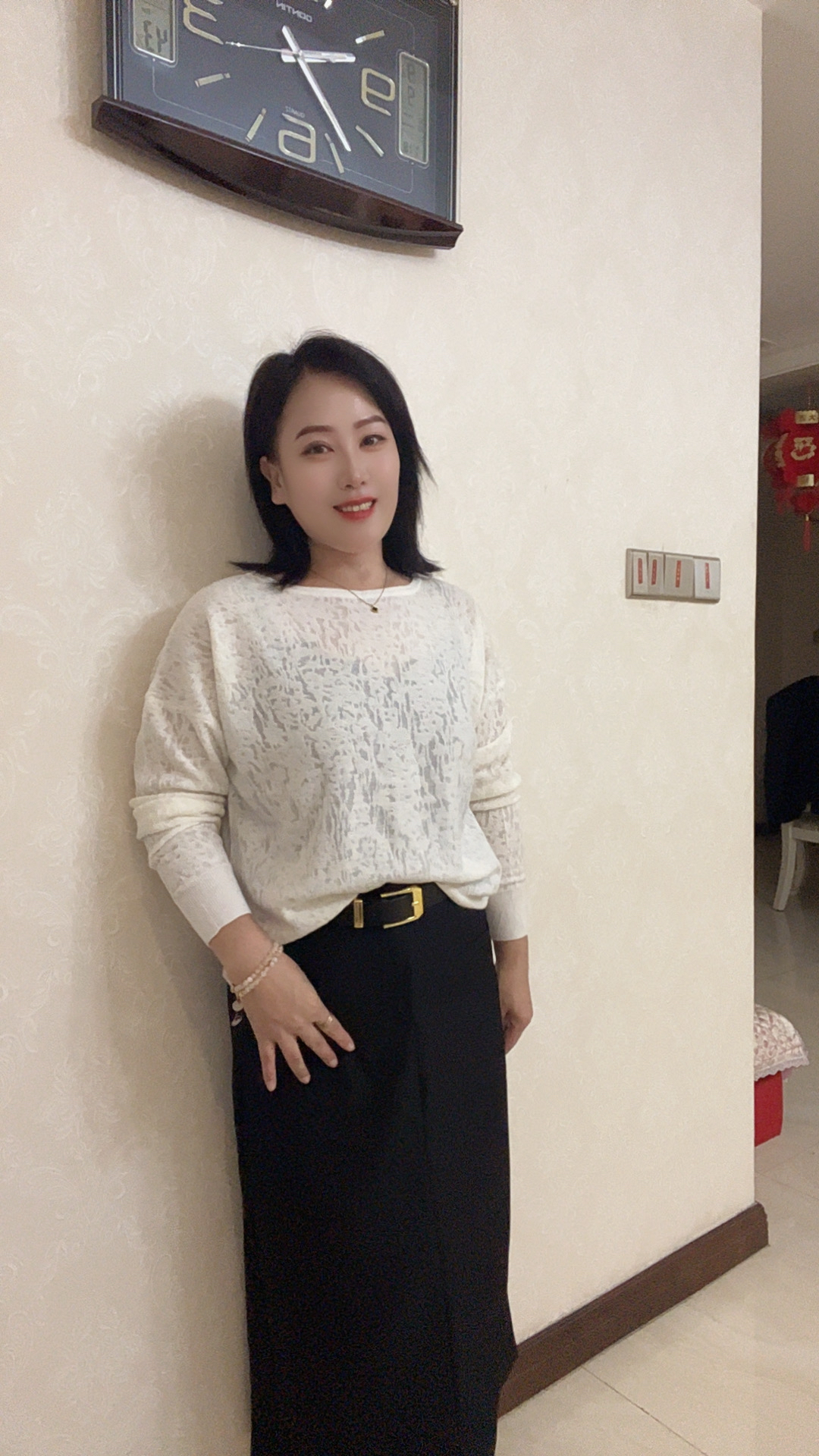 莲儿家.通勤静奢风提花针织后拉绳小衫