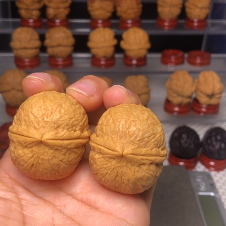 文玩核桃把件9佛陀元宝