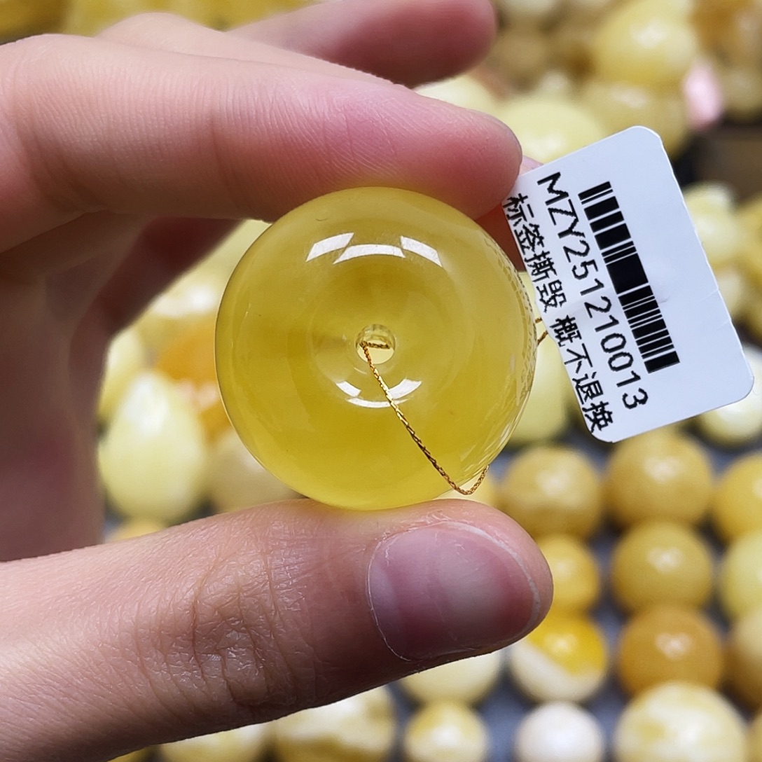 蜜蜡未镶嵌裸石27.7*16.7mm.瑕