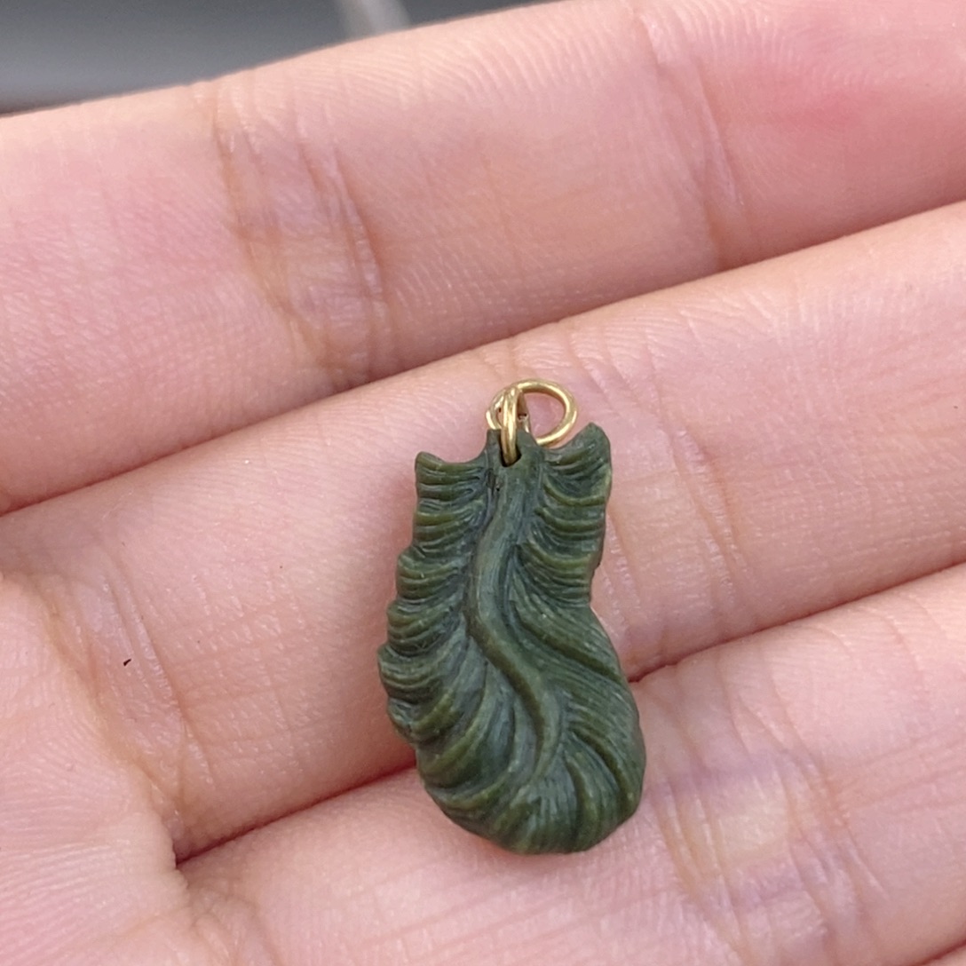 绿松石未镶嵌。扭扭羽毛