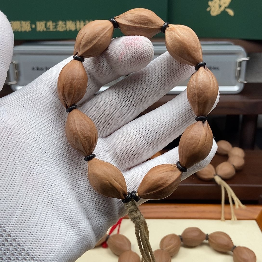 橄榄核手串1627三面佛一条