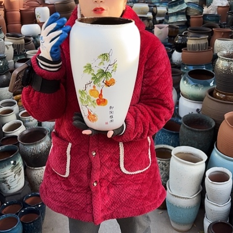 口17高33瑕疵盆子。