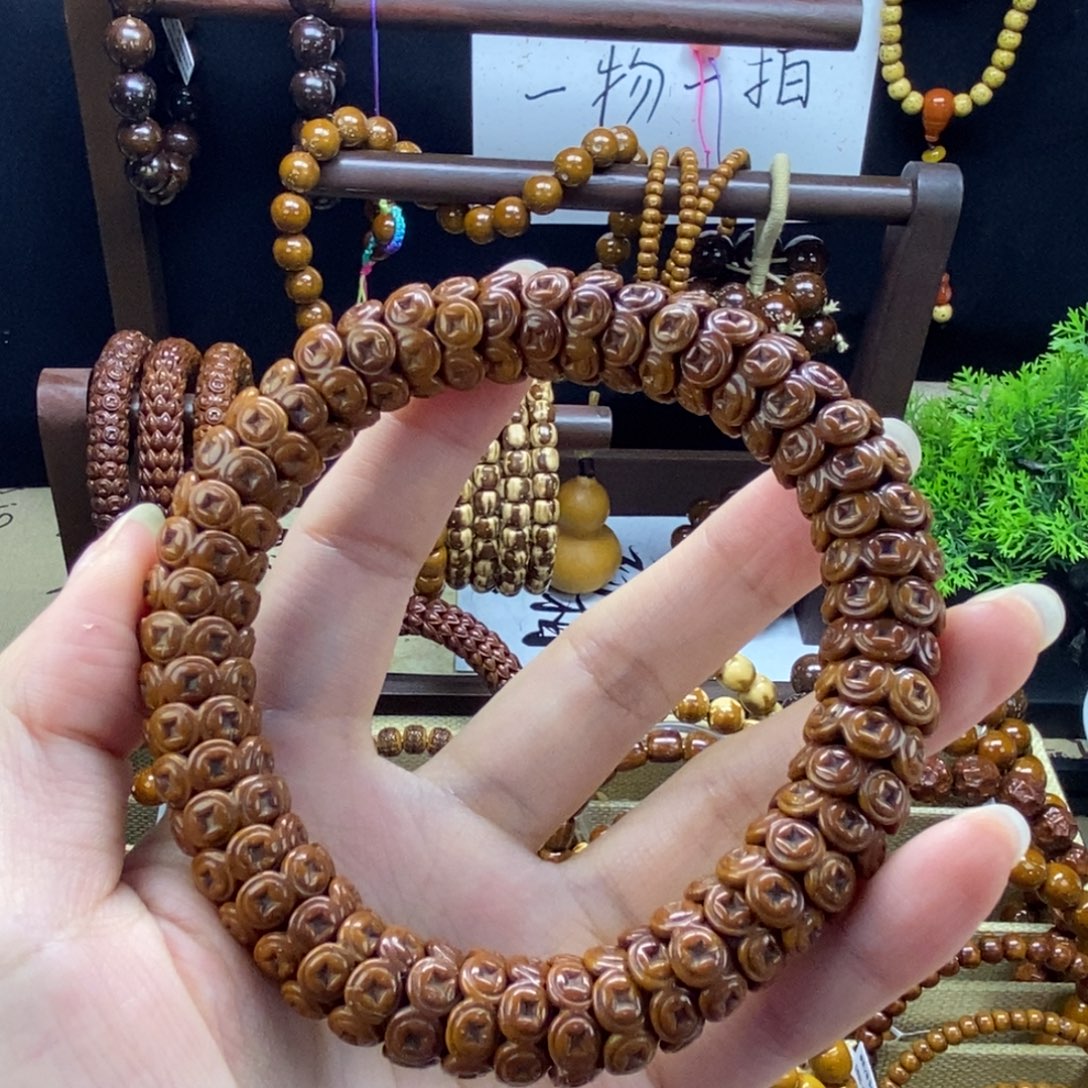 紫金鼠手串雕刻钱币