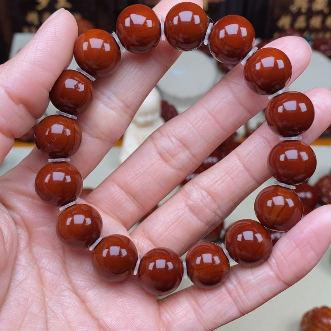 橄榄核吊坠张***?光珠，