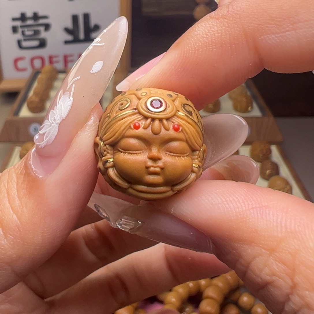 文玩核桃把件镶嵌款扎基拉姆18左右尺寸有正常封口线