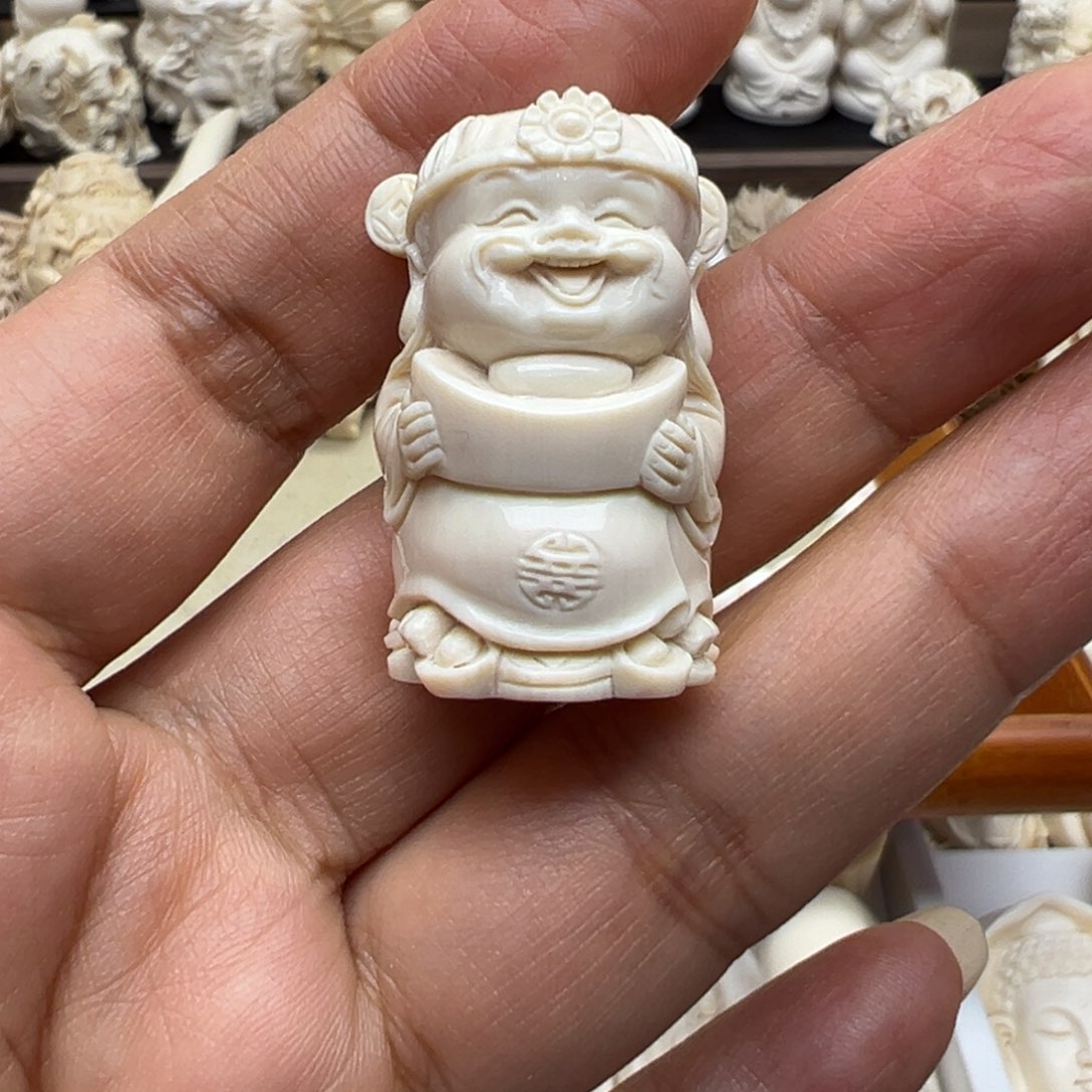 白玉菩提吊坠精****床猛犸