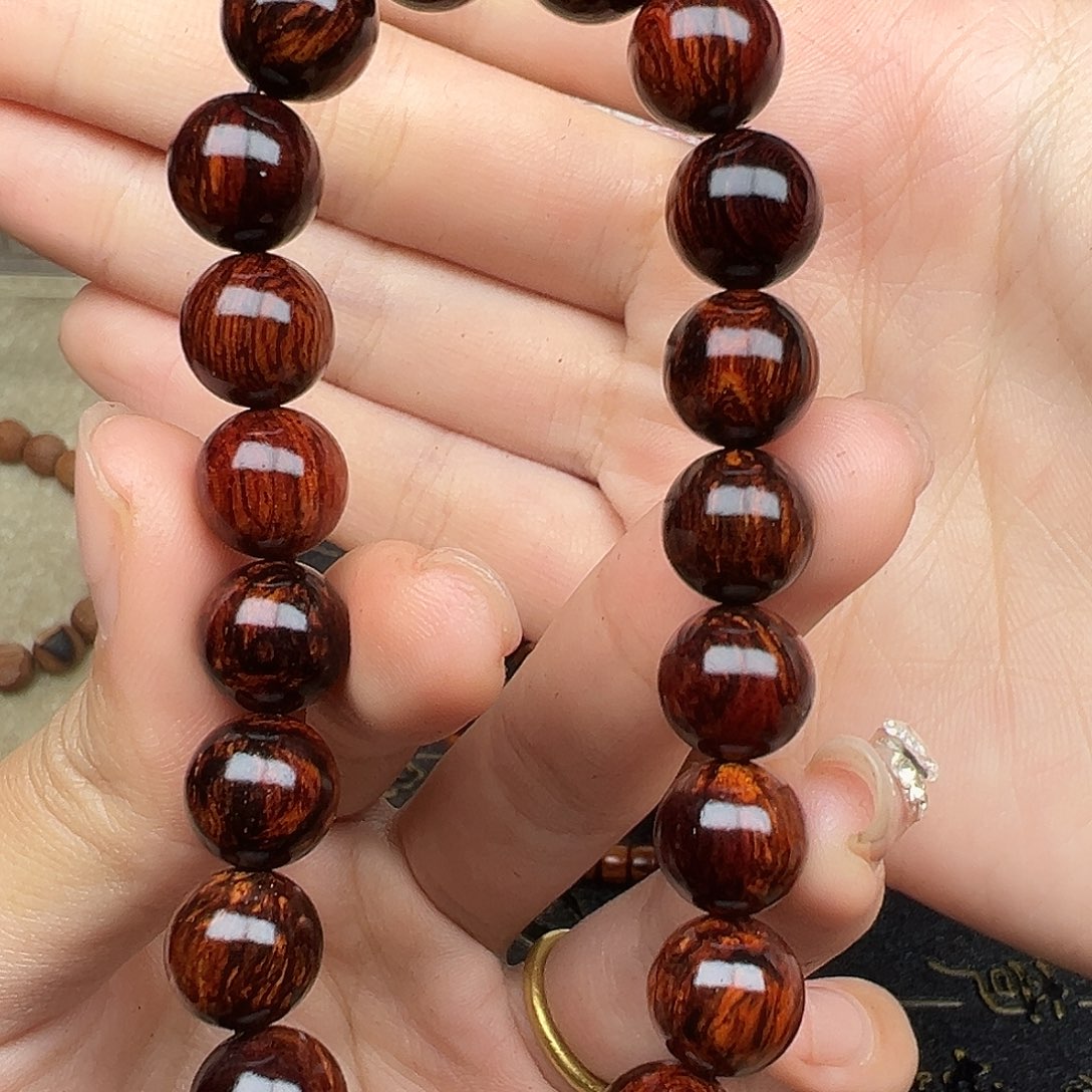 木红降10圆珠黑金满油（瑕疵）