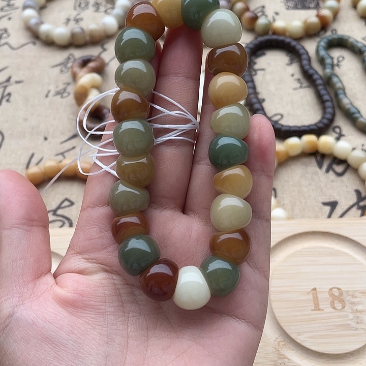 *****手串菩提根/象牙果卡14蒜瓣玉化