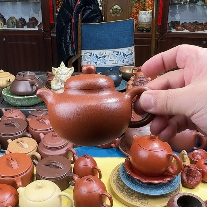 紫砂茶壶柿圆降坡