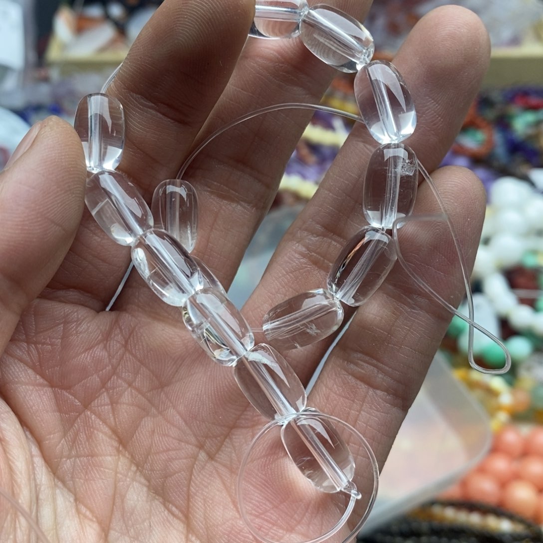 玛瑙/玉髓未镶嵌珠宝半成品两个天然8×12透体白水晶胶囊珠