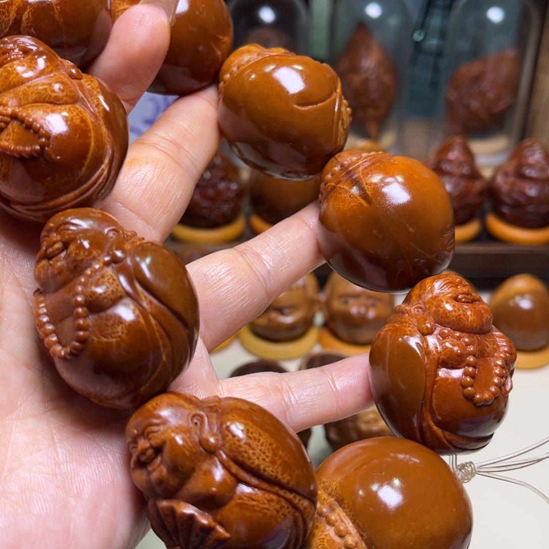 橄榄核把件肆***道新款弥勒手持