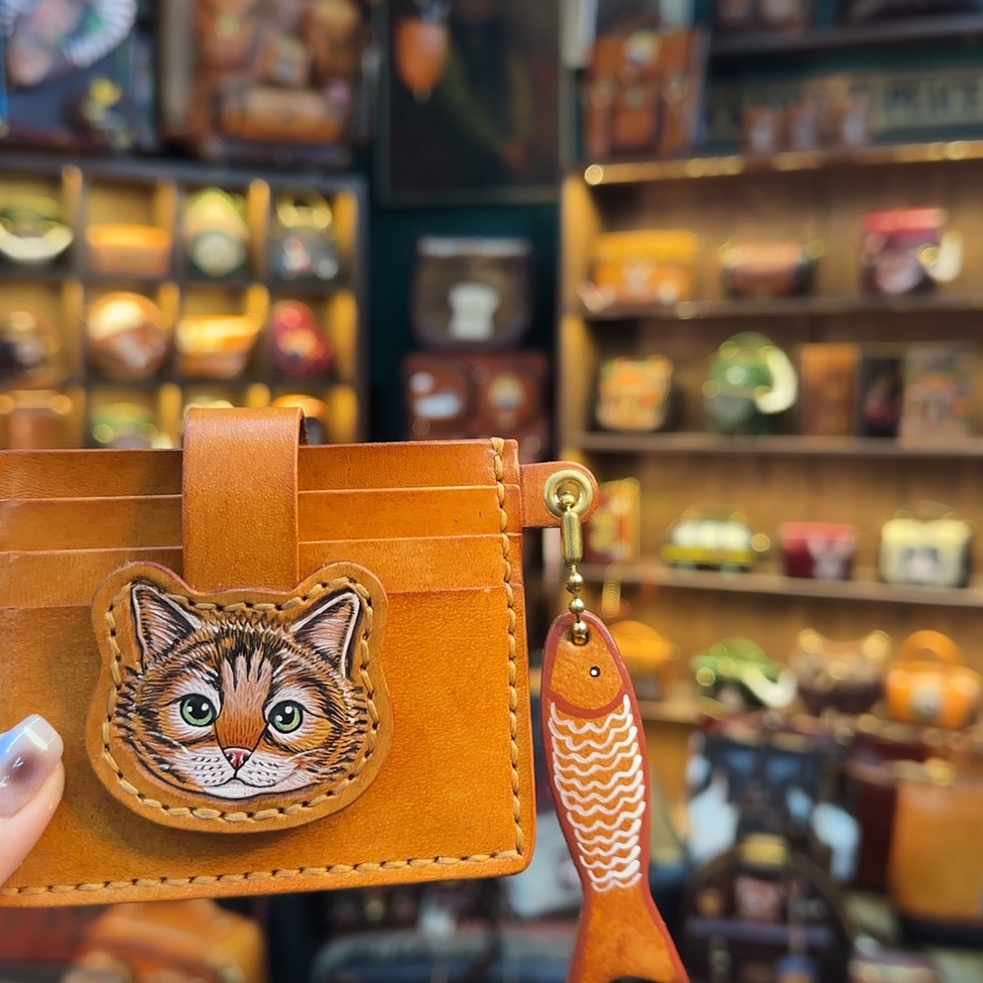 海***兔牦牛剖层皮革黄棕色奶猫卡包