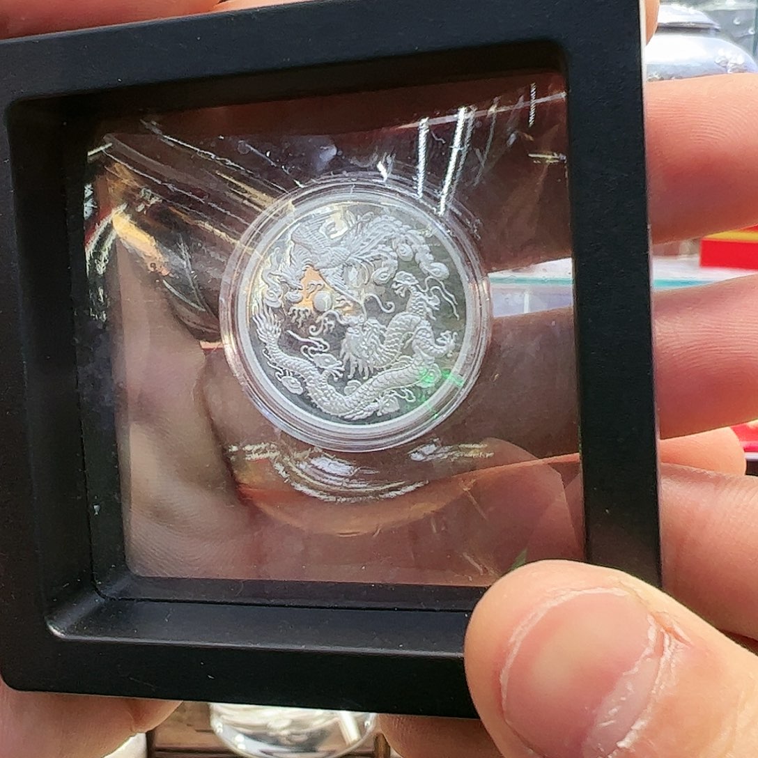 砖雕高手工龙凤币约5g