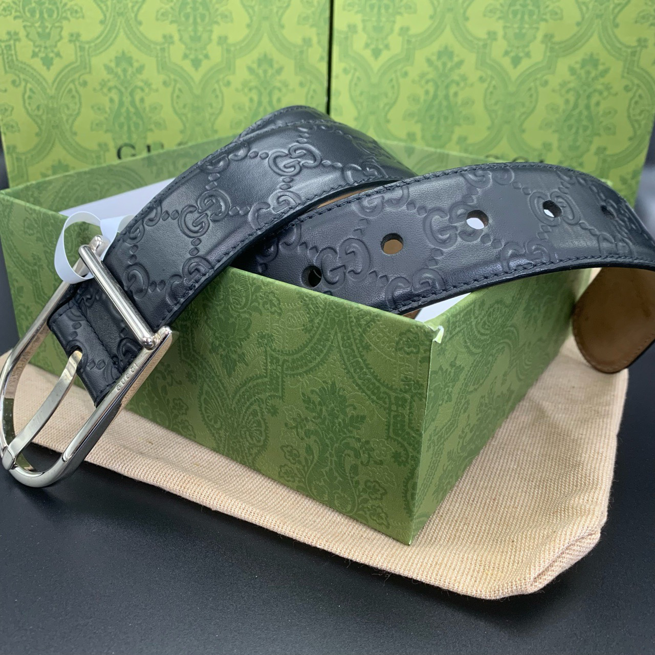 99新 GUCCI/古驰 99新古驰银色针扣 满印压花腰带 黑色/棕色宽4cm