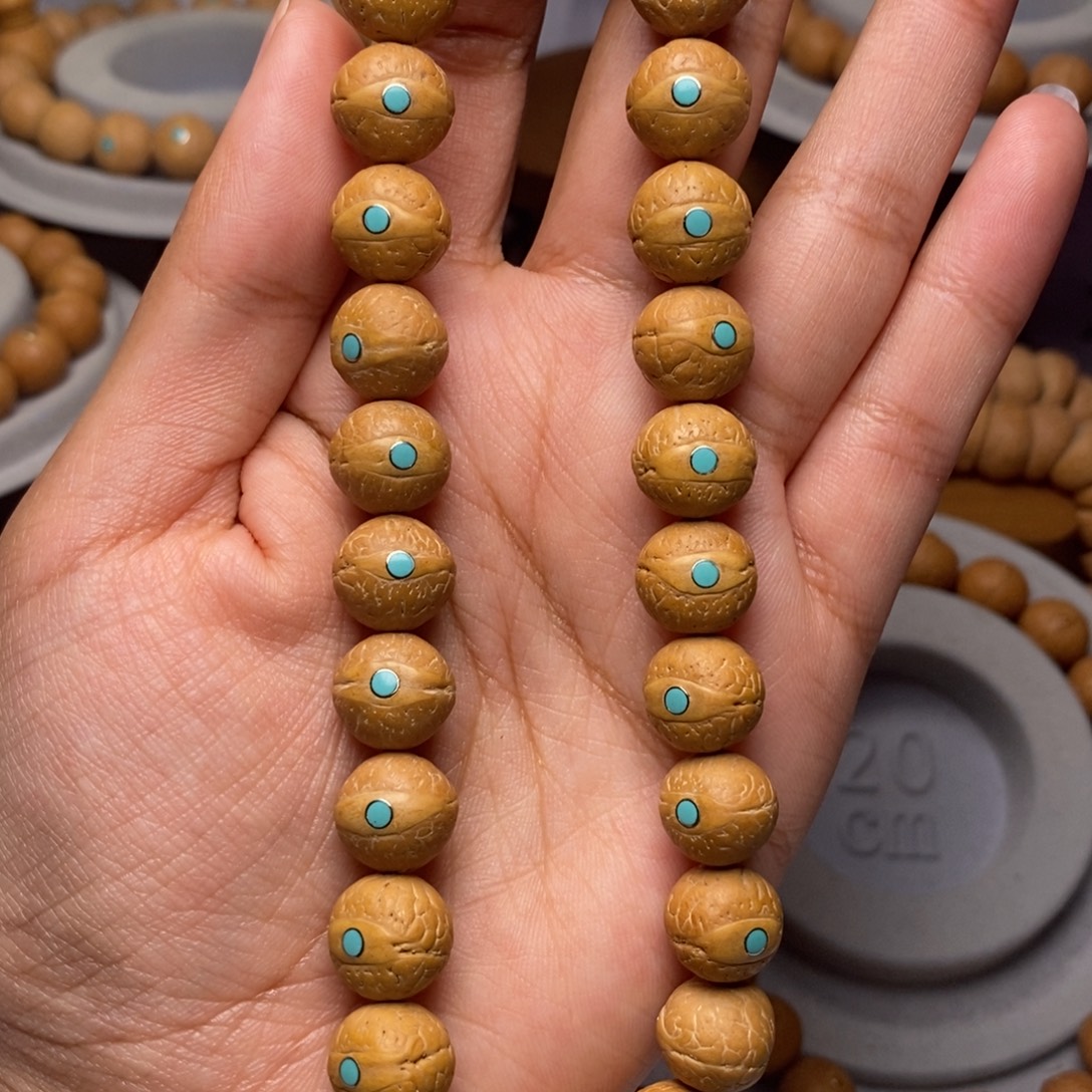 凤眼菩提吊坠手持