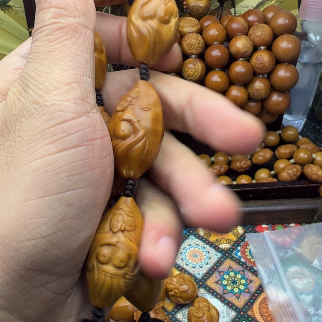 子***韬橄榄核手串/手链返油七仙女