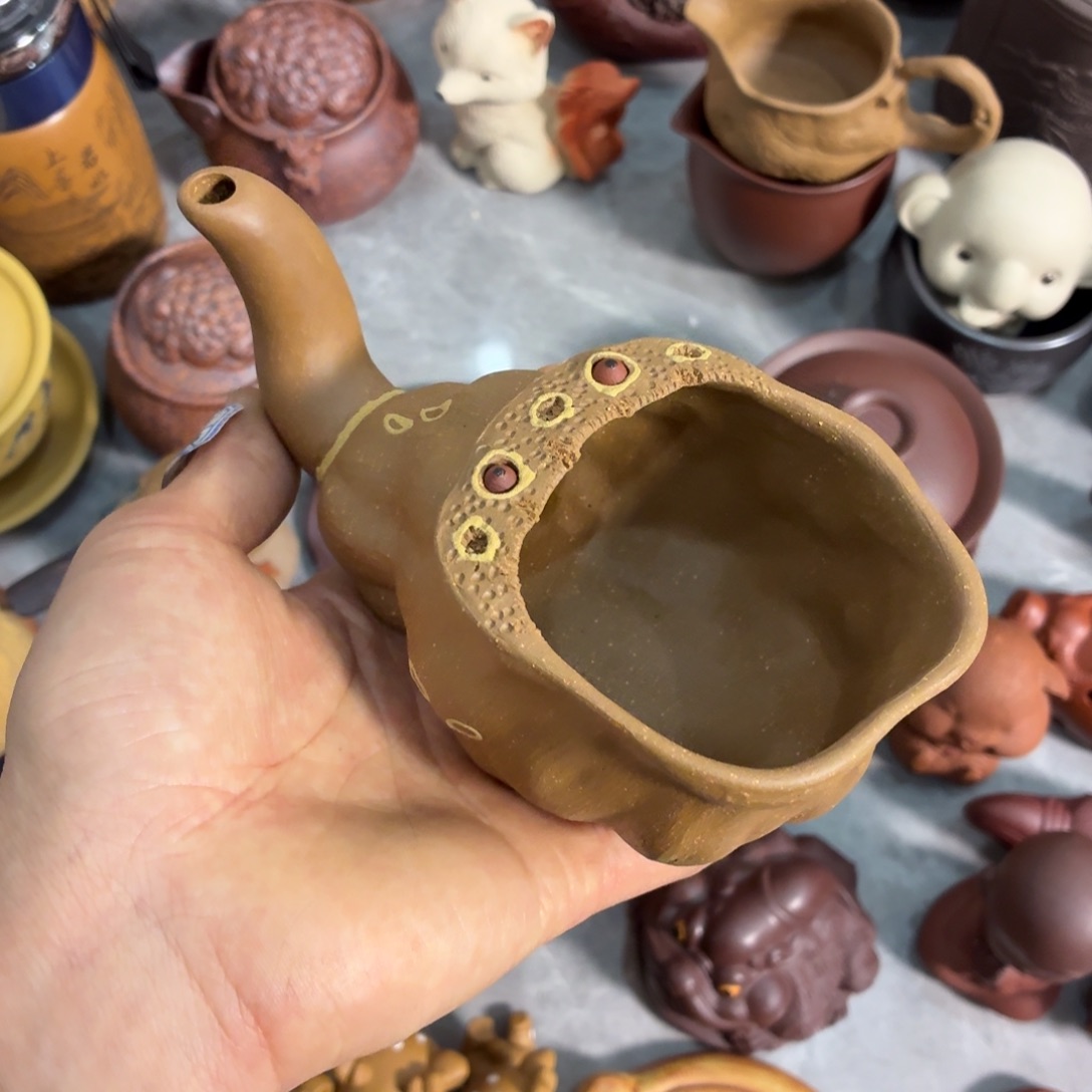 紫砂茶杯放漏放漏放大漏了