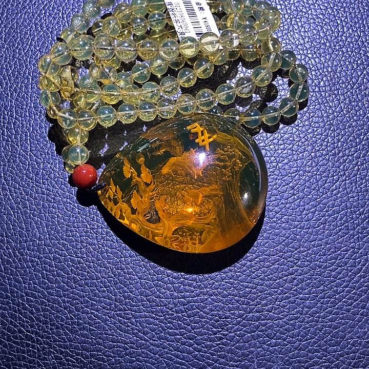 裸石琥珀未镶嵌紫*瑰老子出关