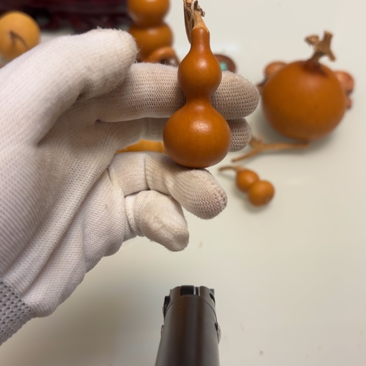 锅***财天然手捻的小葫芦