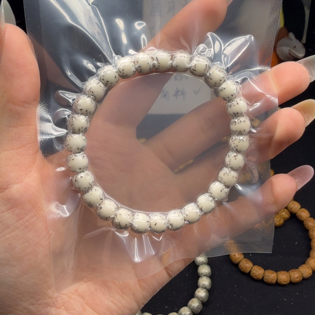 木***李星月菩提吊坠卡8石玉河豚