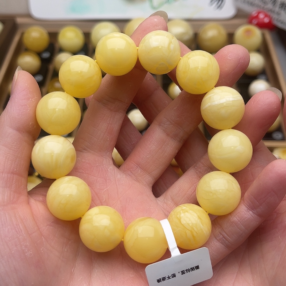 余***生琥珀未镶嵌裸石蜜蜡手串鸽