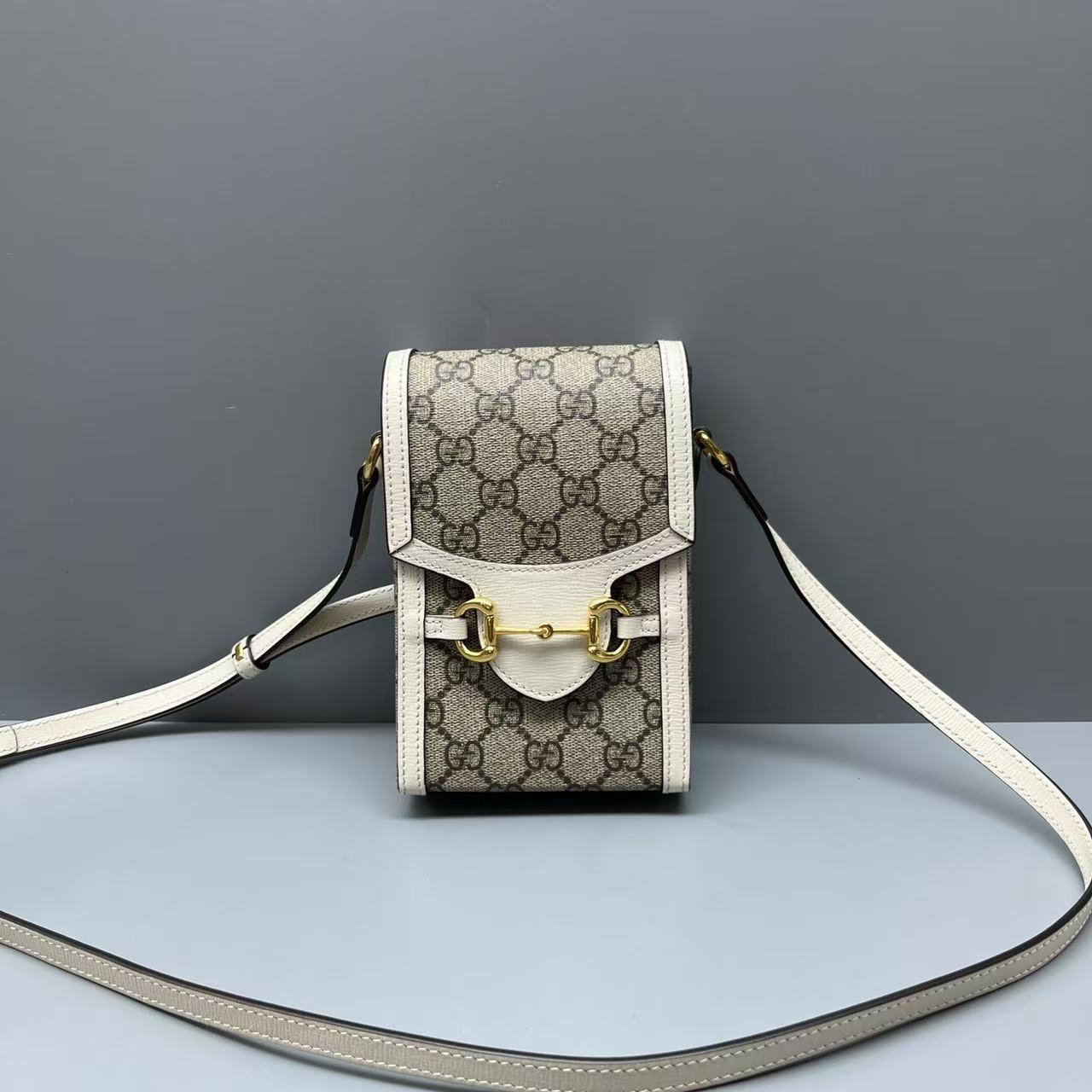 95新 GUCCI/古驰 老花1955马衔扣手机包 尺寸11*17 SV15975
