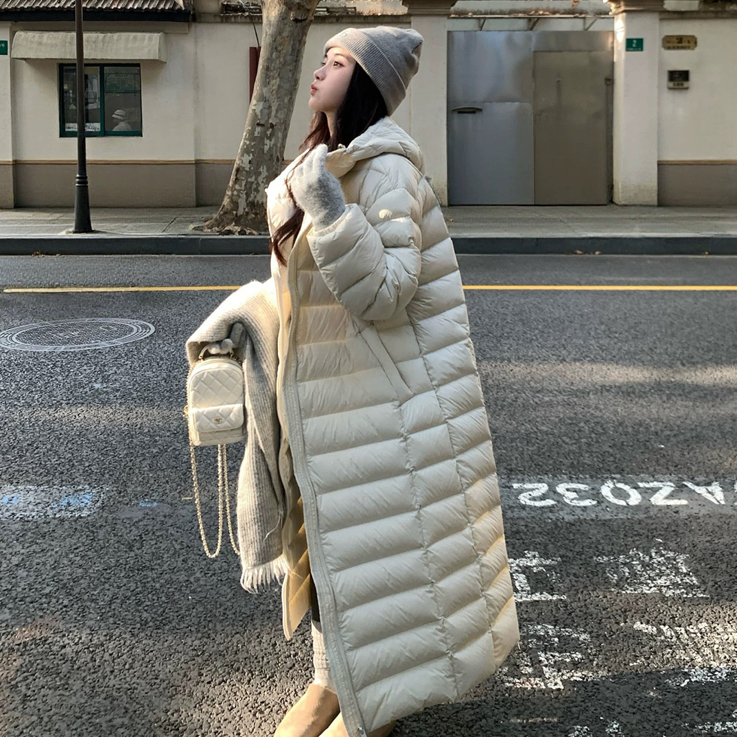 MM-384冬季连帽排骨女过膝保暖泡芙设计时尚显瘦外套