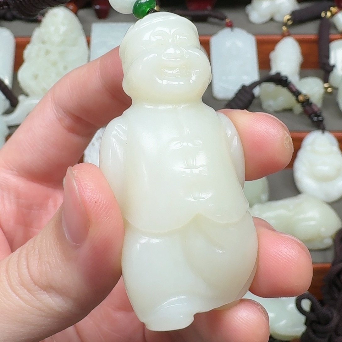 晗***沁和田玉未镶嵌把件