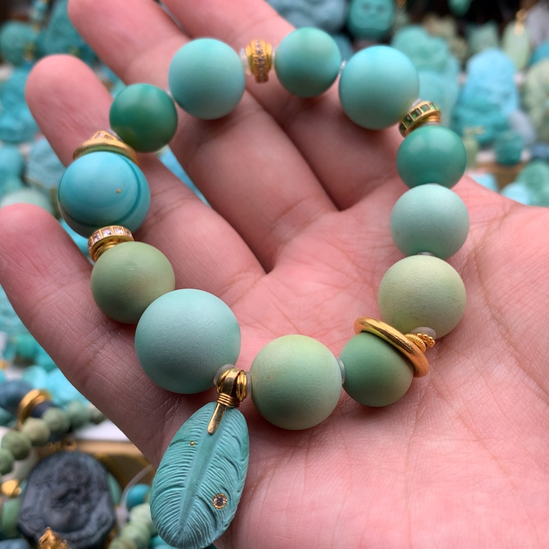 爱***熊18K金镶嵌绿松石手链