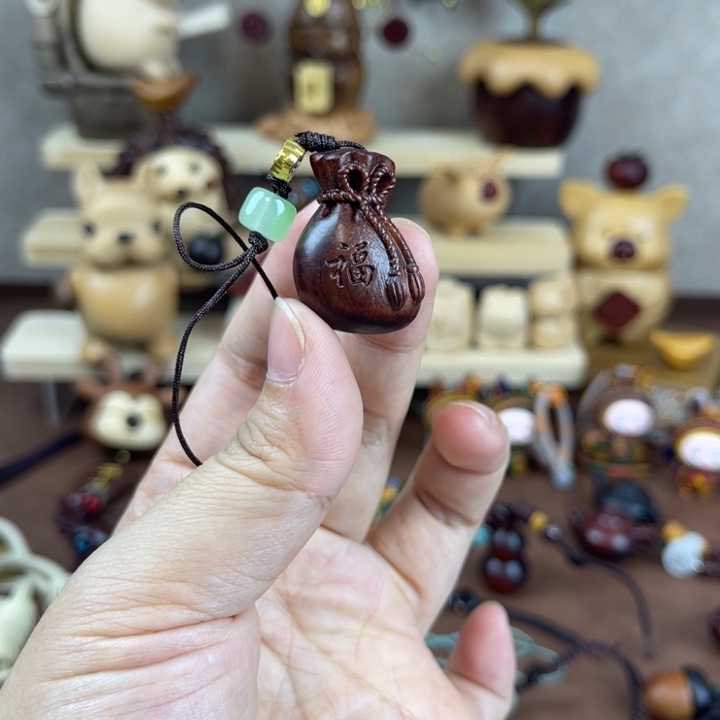 紫檀木小福袋一个