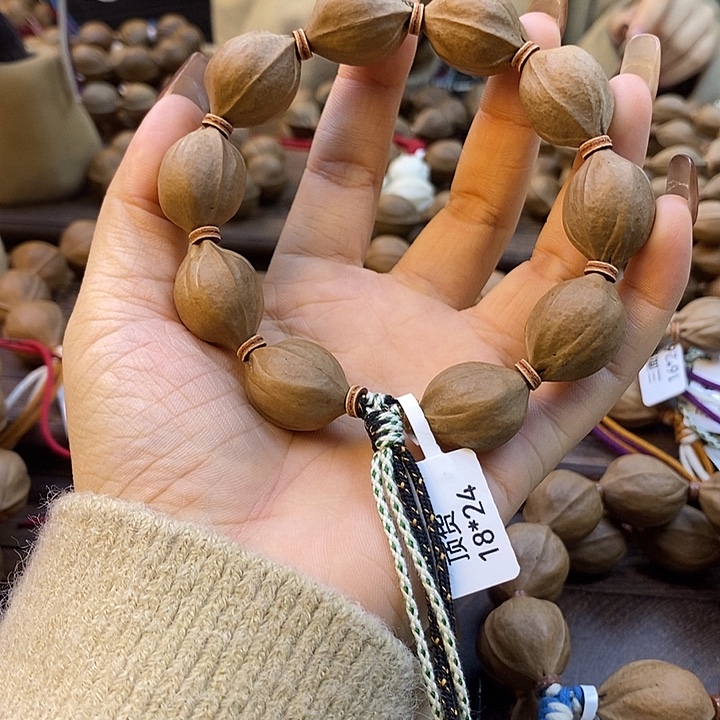 我***啤吊坠橄榄核梅林铁核